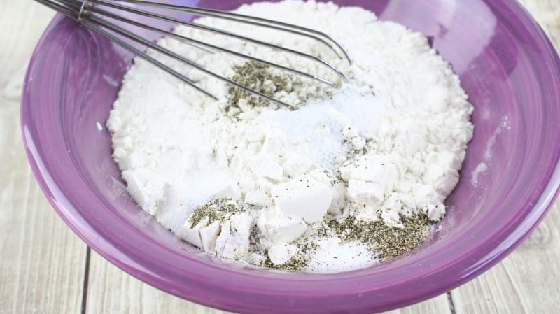 Flour and salt and pepper in mixing bowl.
