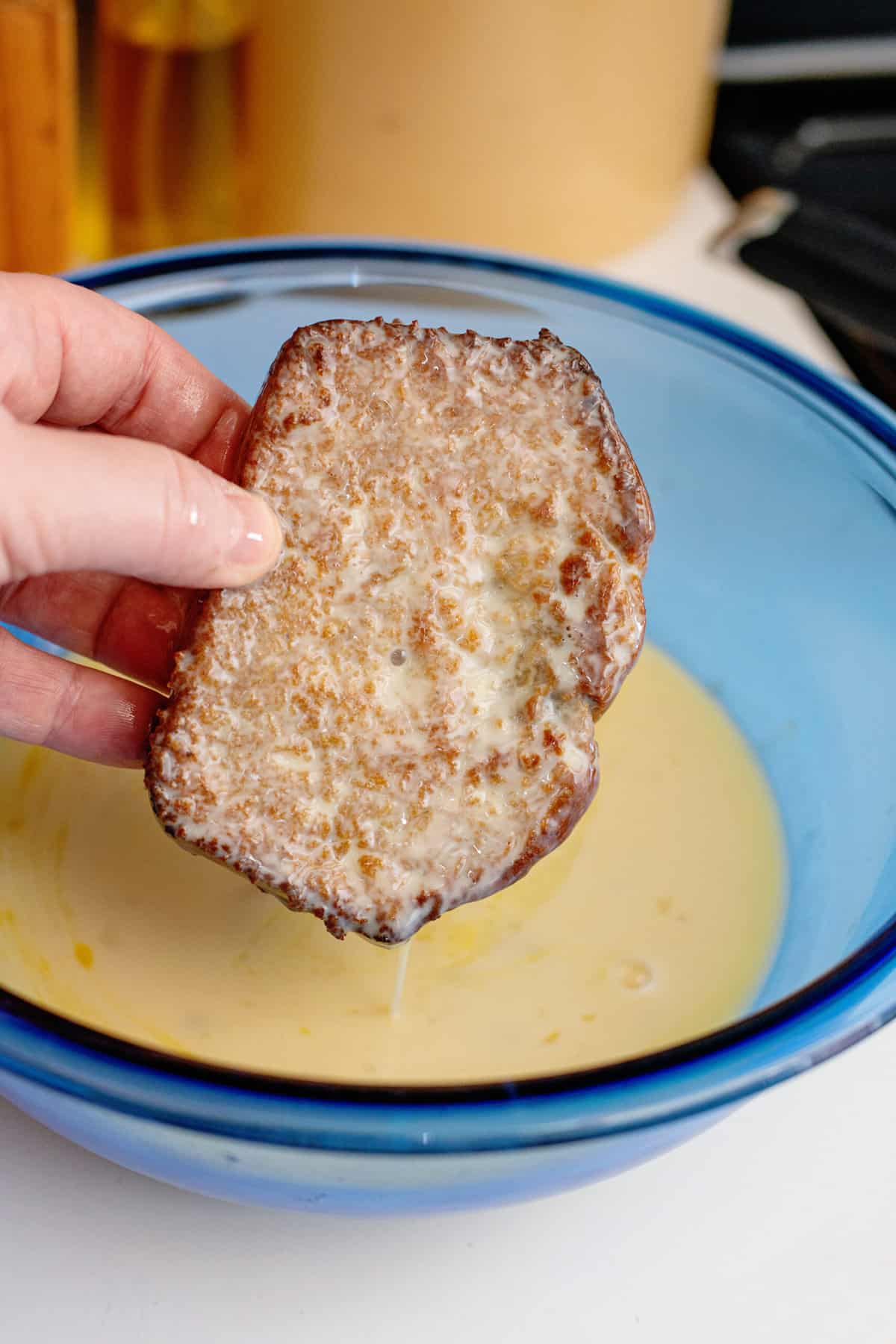 dip both sides of bread in the batter