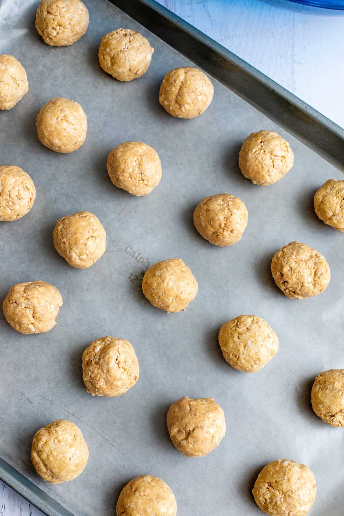 put peanut butter balls on cookie sheet and freeze
