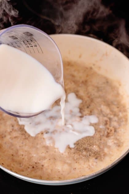 Add milk to skillet.