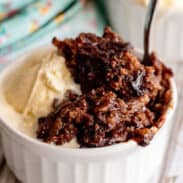 Bowl of chocolate cobbler with ice cream.