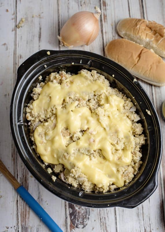 Spread other half of soup over top of crock pot dressing.