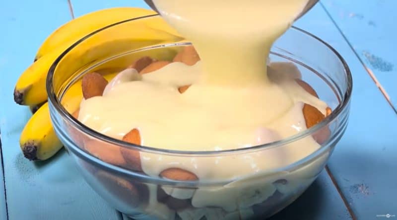 Pour pudding mixture over wafers and bananas.