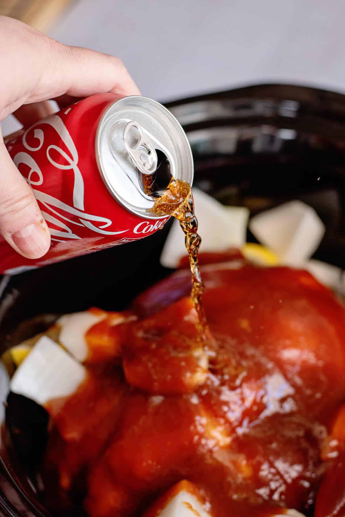 pour coke into pot