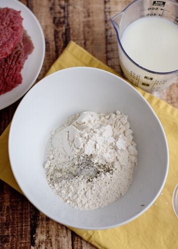 Flour, salt, and pepper in mixing bowl.