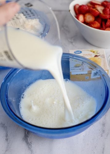 Add milk to mixing bowl.