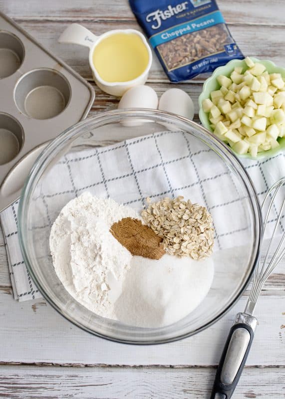 In a large bowl, add flour, sugar, cinnamon, allspice or nutmeg, and oats.