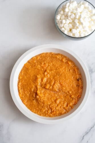 Mashed sweet potato in pie plate.