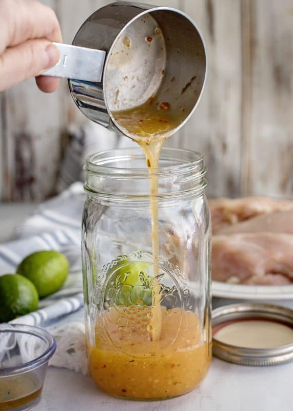 adding Italian dressing to jar