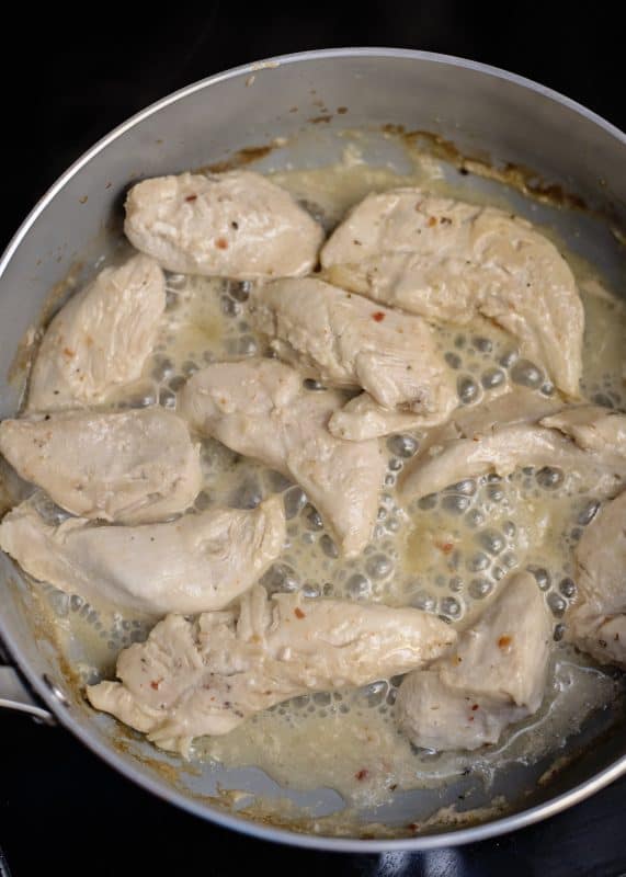 Chicken tenders cooking.