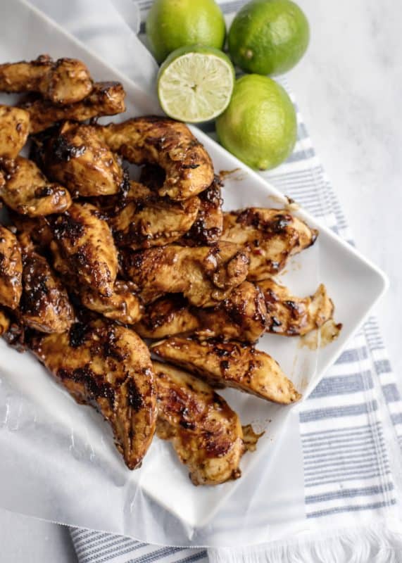 Grilled chicken tenders on serving plate.