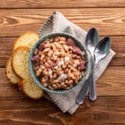 Bowl of pinto beans and ham.