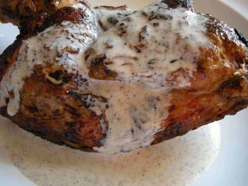 White Barbecue Sauce covering chicken.