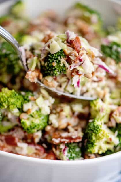 Spoonful of broccoli and bacon salad.