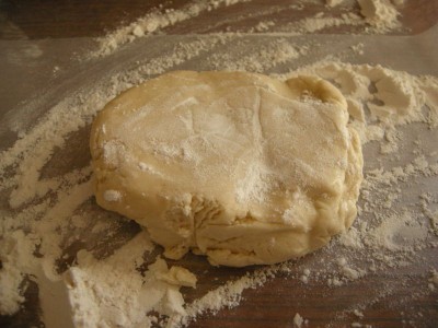 Place dough on floured surface and add flour on top and to rolling pin.