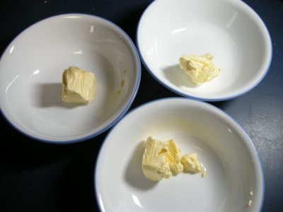 Place 1 tablespoon of margarine or butter in three bowls
