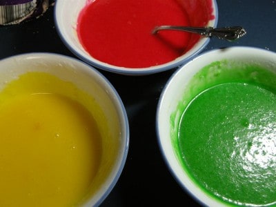 Dye each bowl and stir until the colors are even.