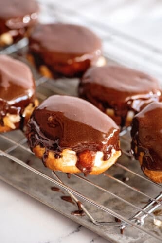 Mini Boston cream pies on wire rack