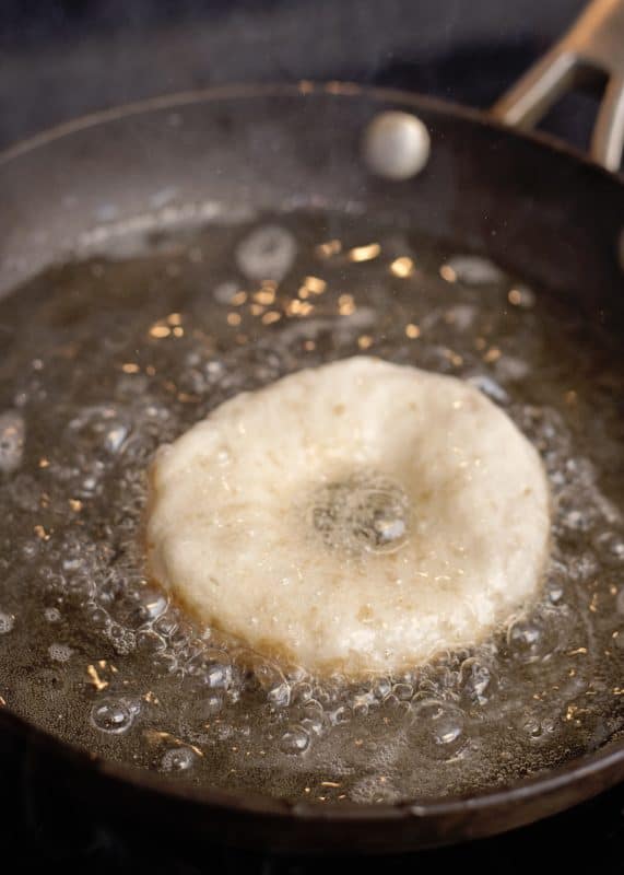 doughnut frying in oil