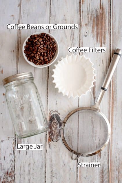 Labeled recipe ingredients and utensils for how to make cold brew at home.
