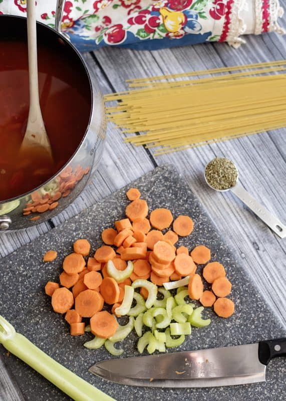 Peel and chop carrots and celery.