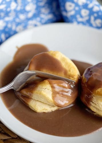 taking a bite with chocolate gravy