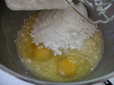 Add flour and eggs to mixing bowl.
