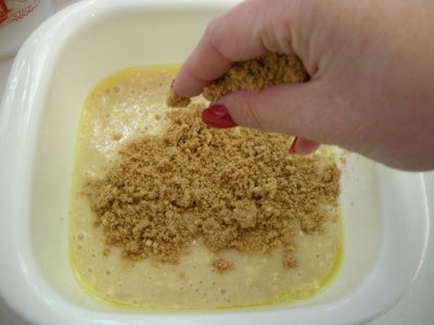 Add 1/4 of the banana cake batter to the pans and top with a 1/4 of the crumb topping.
