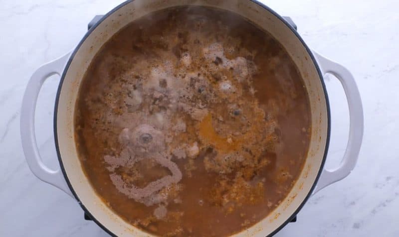 Boil the hot dog chili up gently