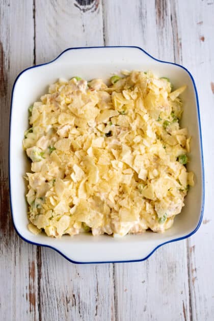 Top casserole with crushed potato chips.