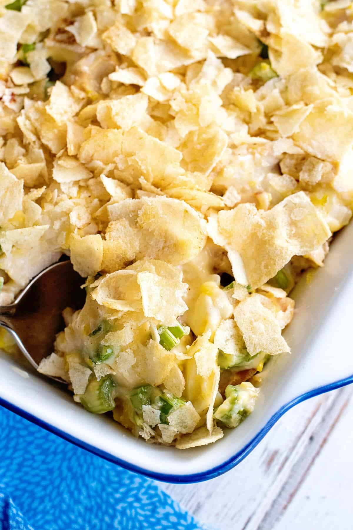 Spoonful of hot chicken salad.