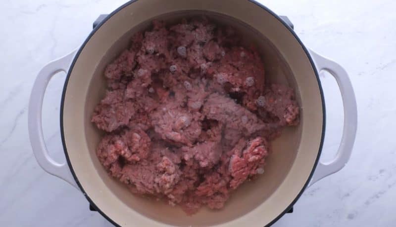 FIll up a pot with water to cover up ground beef