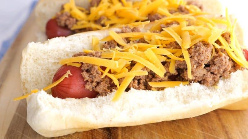 add your cheese to the hot dog and chili