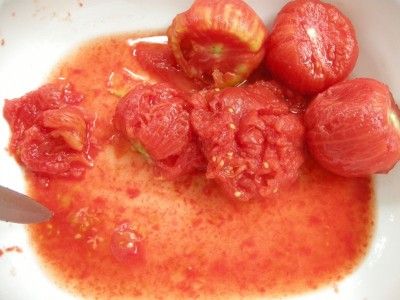 Tomatoes with skin removed.