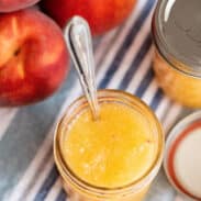 Peach freezer jam in jar.