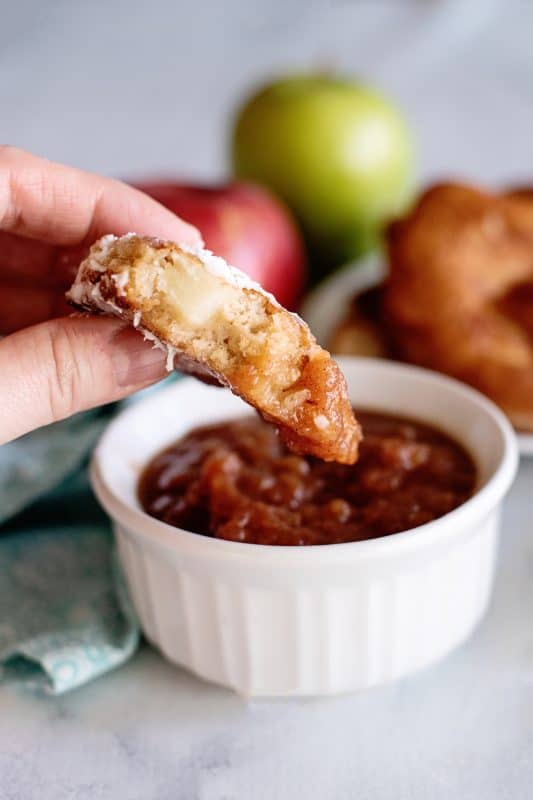 homemade apple fritters dunked in apple butter