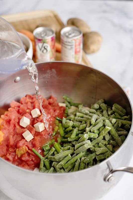 Add beef broth to pot.