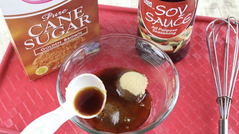 Combine soy sauce and brown sugar and mix well.
