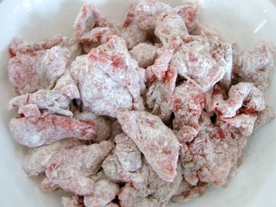 Stew meat coated in flour.