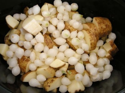 Add pearl onions to slow cooker.