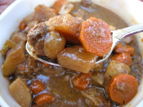 Spoonful of traditional beef stew.