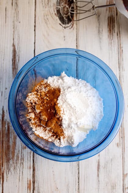 Add cinnamon and sugar to mixing bowl.