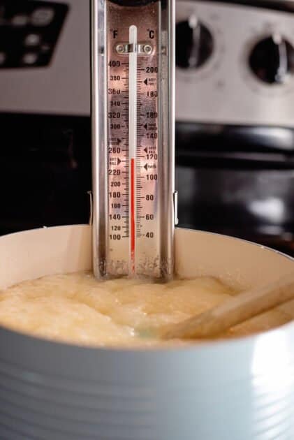 Candy thermometer in the pot.