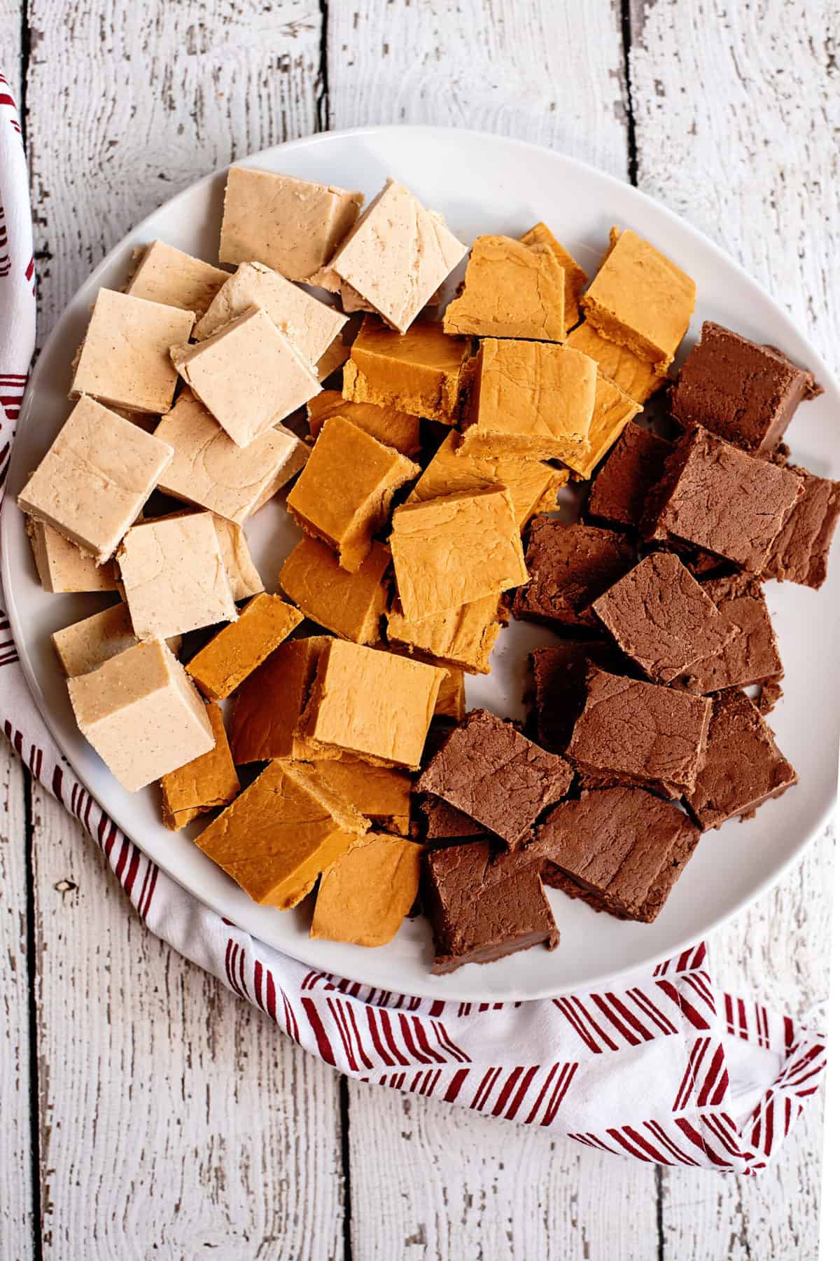 Platter filled with three different flavors of homemade fudge.