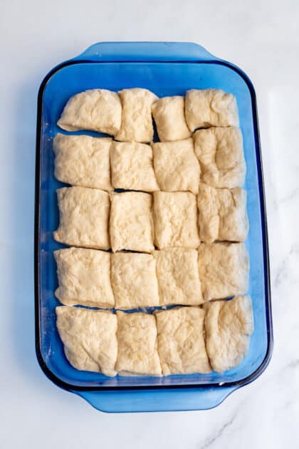 Place yeast rolls in baking dish.