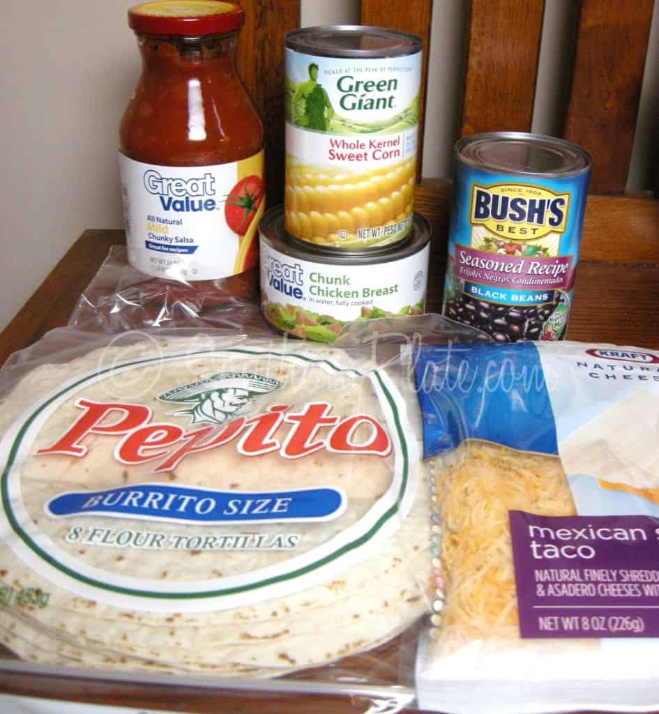 Ingredients for chicken quesadillas: flour tortillas, salsa, black beans, corn, chicken, and shredded cheese