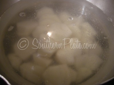Add potatoes to water and bring to a boil.