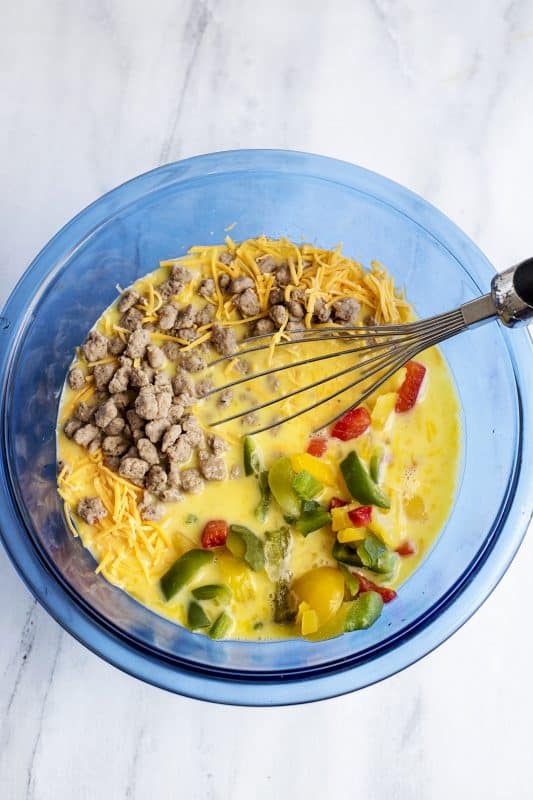 Add pepper and onions to mixing bowl.