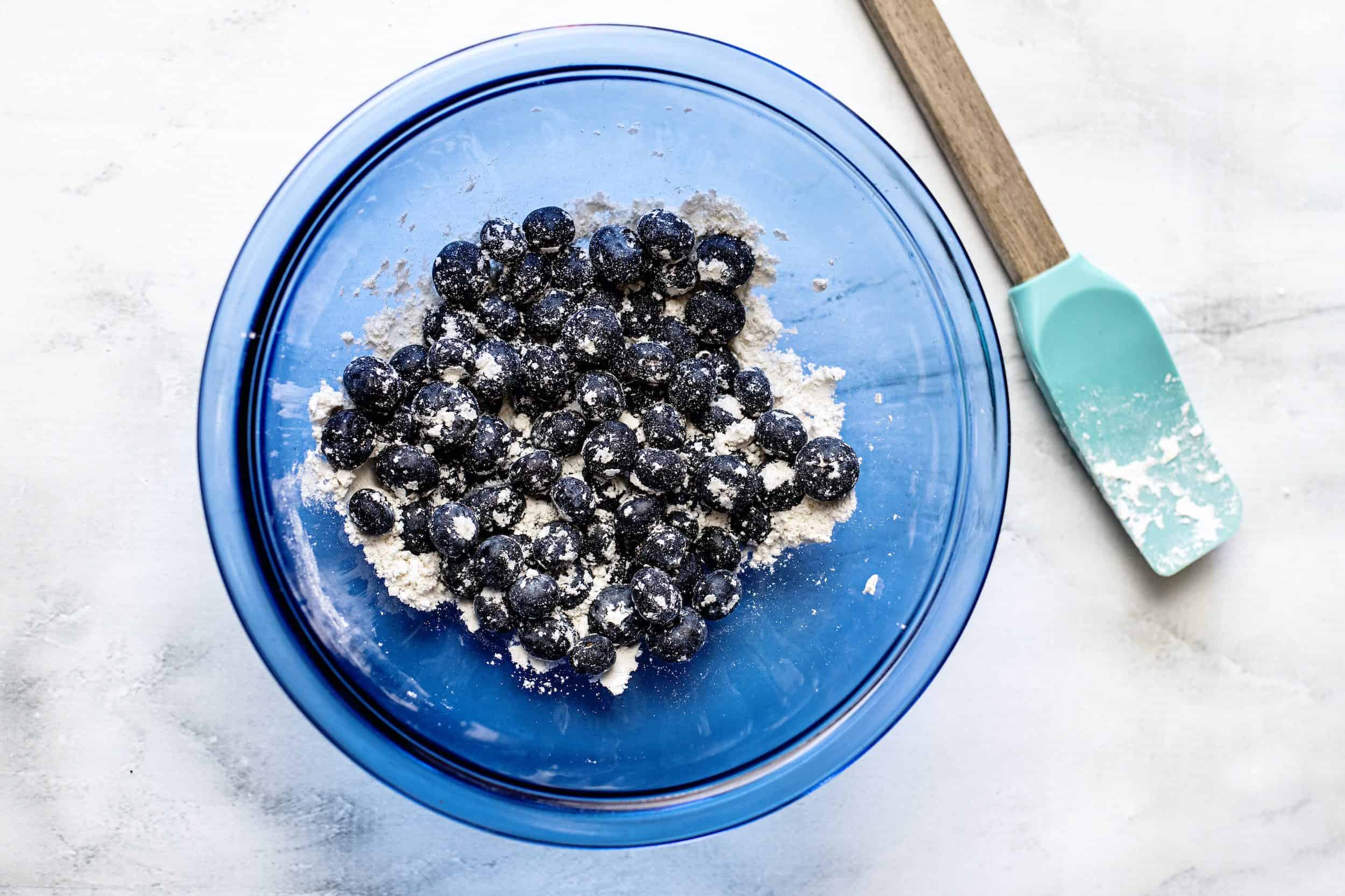 Stir together baking mix and blueberries.