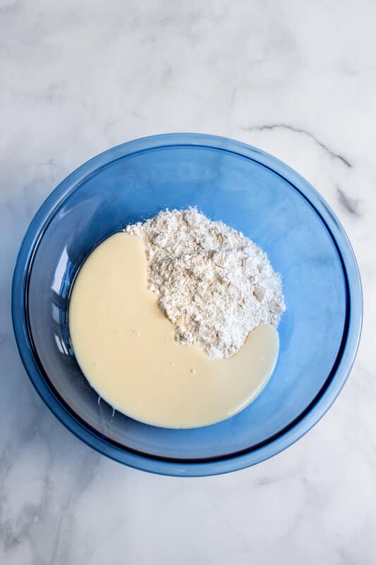 Add sweetened condensed milk to mixing bowl.